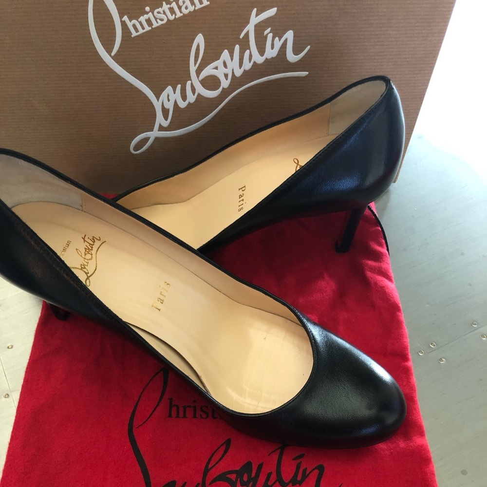 Christian Louboutin Red Bottoms- short heel
